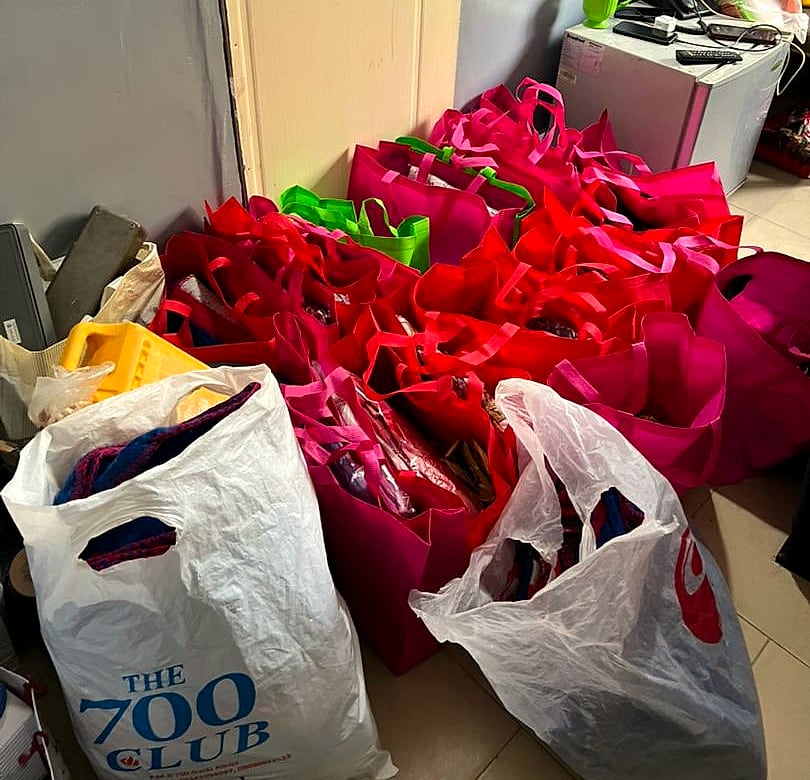Donated items packed in gift bags
