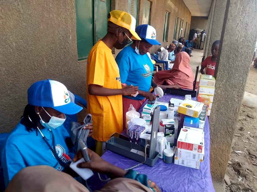 Medical volunteers dispensing medication